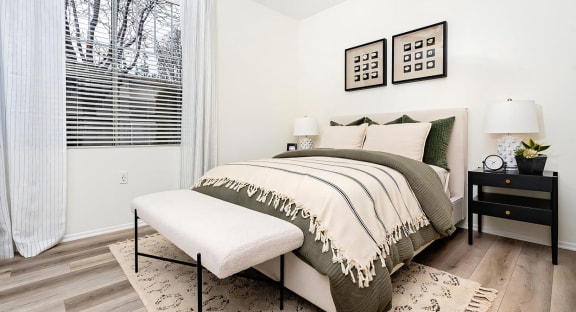Spacious Bedroom with Wood Style Flooring