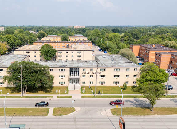 A large building with the words "Campbell Gardens" on the front.