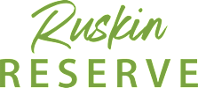The image shows the text "Ruskin Reserve" in black on a white background.