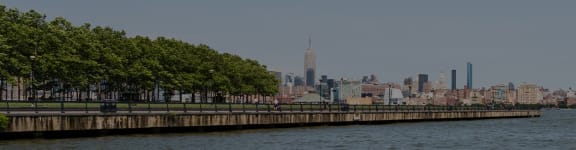 a view of the empire state building from the hudson river at The Enclave, Jersey City, New Jersey