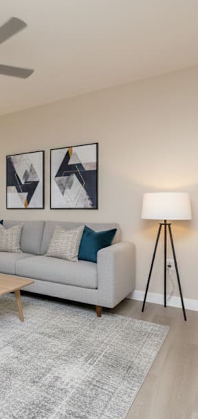 Empty room with a brown carpet and white walls.