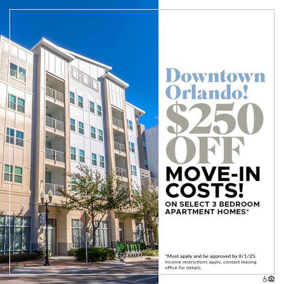 A building with a sign offering $250 off move-in costs for select 3 bedroom apartment homes.