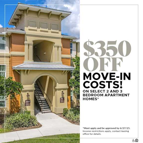 A building with a sign offering $350 off move-in costs for select bedroom apartment homes.