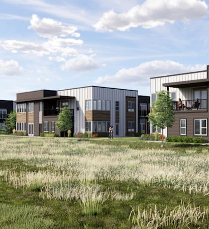 a rendering of a group of houses in a field at The Daniels at Northern Gateway, Saukville, WI 53080