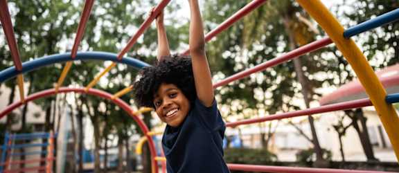 A child playing on a playground.
