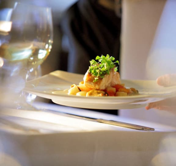 a plate of food on a table at a restaurant
