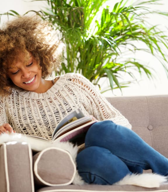 Woman Reading A Book at Preserve West, Madison, 53711