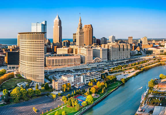 A cityscape with a river running through it.