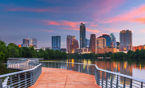 a view of the minneapolis skyline from the riverfront boardwalk at Monterey Ranch, Austin, TX