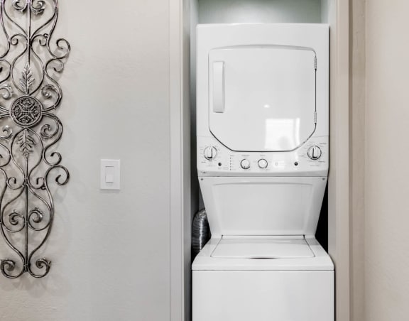 a washer and dryer in a bathroom