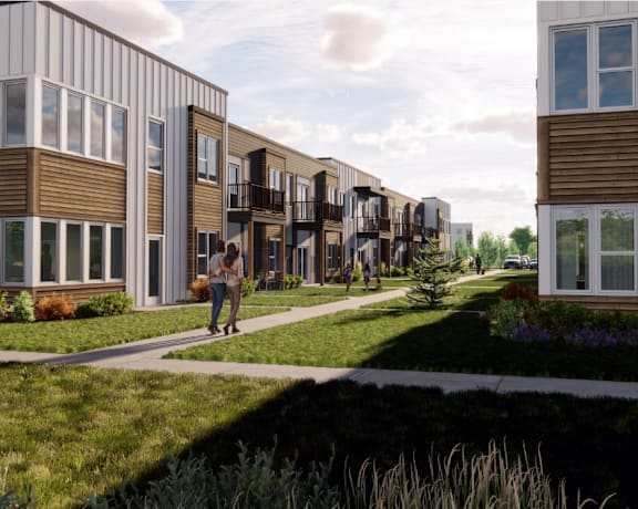 a rendering of a residential neighbourhood with people walking on a sidewalk at The Daniels at Northern Gateway, Saukville, WI 53080