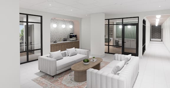 A modern living room with a white sofa and a wooden coffee table.