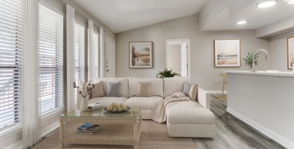 a living room with a fireplace and a sliding glass door
