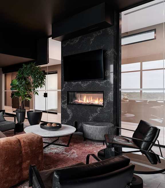 A modern living room with a view of the city.
