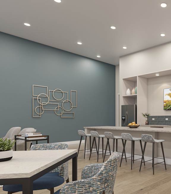 A modern kitchen with a dining table and chairs.