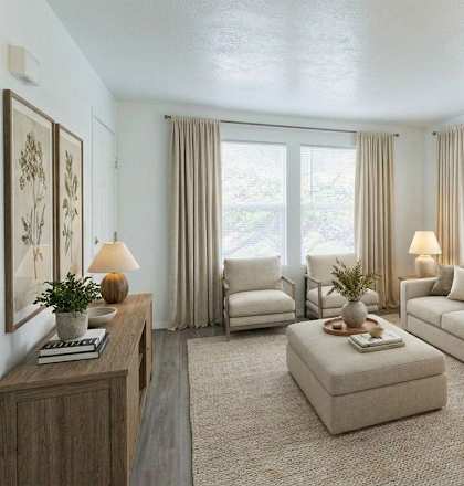 A well-lit, spacious living room with a large window, a couch, a coffee table, and a side table with a lamp.
