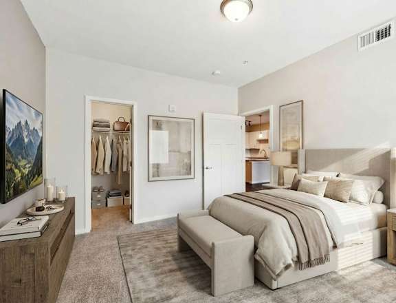 Bedroom with large bed at Aster Meadow, Vadnais Heights, MN, 55127
