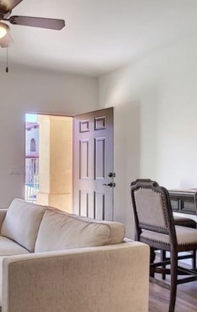 a living room with a couch and a tv