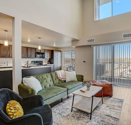 a living room with a couch and a table