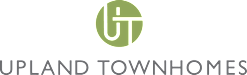 a green logo with the words upland townes