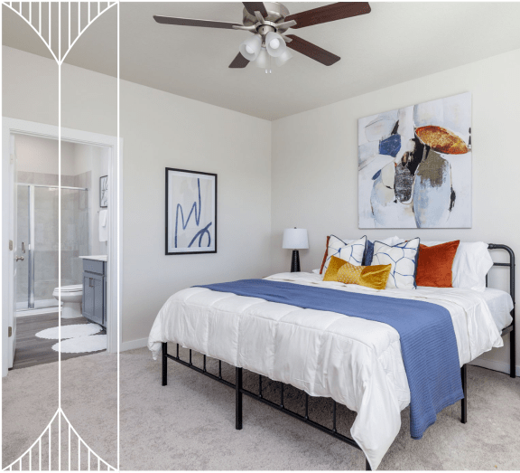 a bedroom with a bed and a ceiling fan