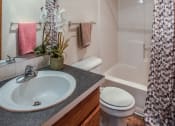 Thumbnail 9 of 32 - Farr Court Apartments Bathroom Sink and Shower