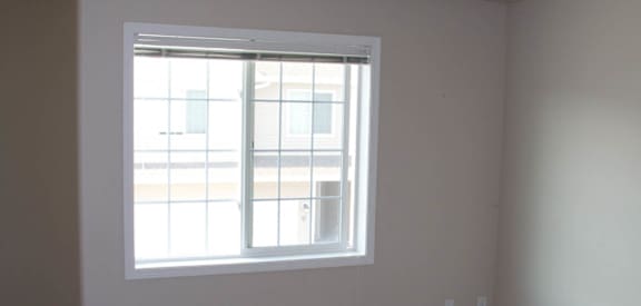 an empty room with a large window