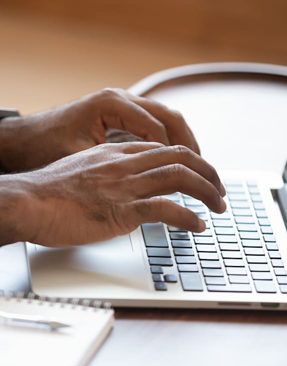 Person Working on Laptop
