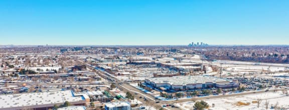 Aerial View of The Village at Arvada and View of Downtown Denver
