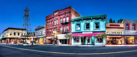 A street view of a town with a Ferrando store and a Florence store.