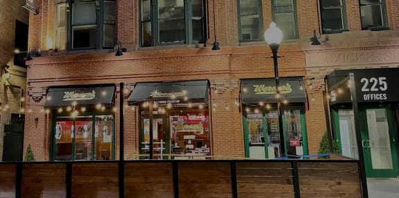 a brick building with a street light in front of it
