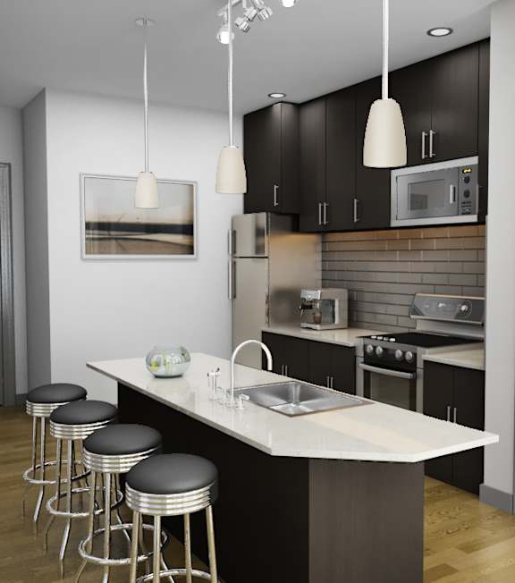 A modern kitchen with a white island and black cabinets.