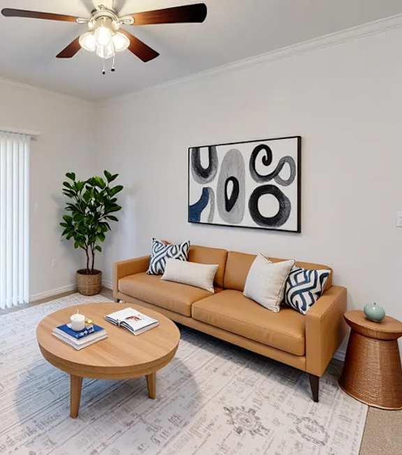 A living room with a couch, chair, and coffee table.