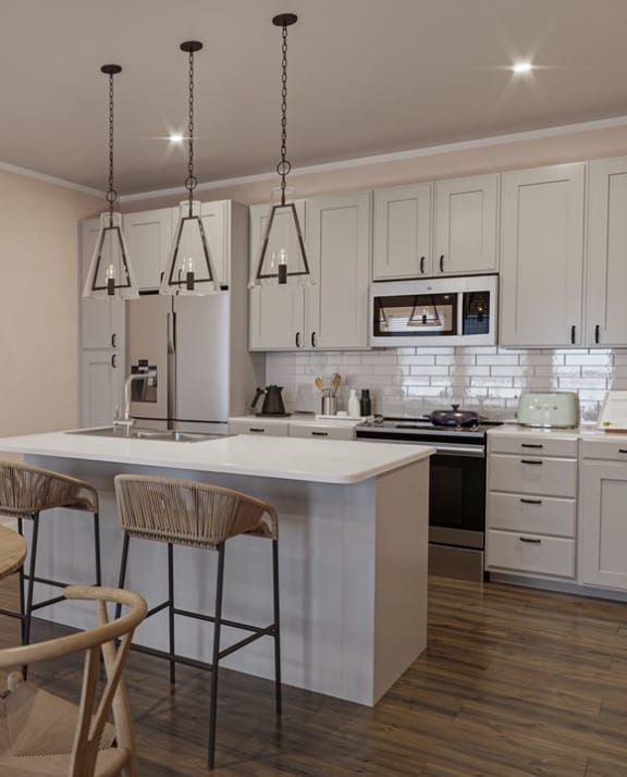 Kitchen and dining room with table and chairs at Waterleaf at Salt Creek luxury apartments in Savannah, GA