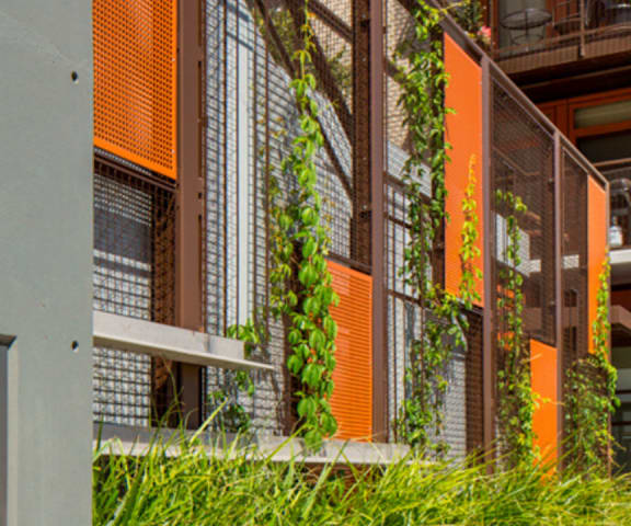 A sign that says LEED Platinum 2012 is on a wall.