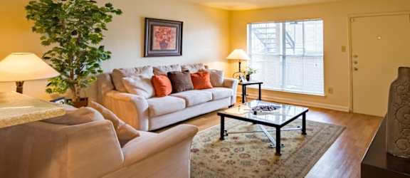 a living room with a couch and a coffee table