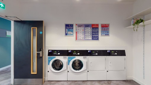 a washing machine and dryer in a laundry room