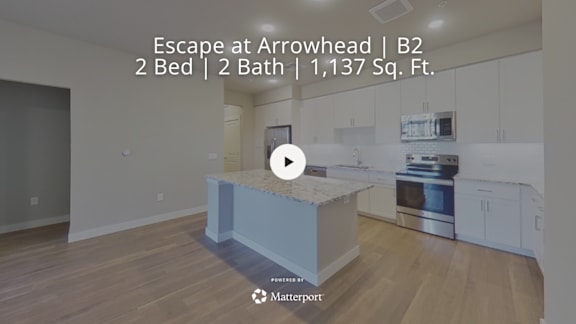 A video thumbnail for a property listing at Escape at Arrowhead | B2, a 2 bedroom, 2 bathroom apartment with 1,137 square feet.