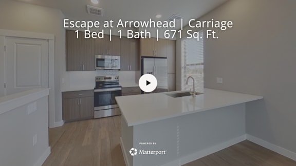 A kitchen with a video play button overlay.