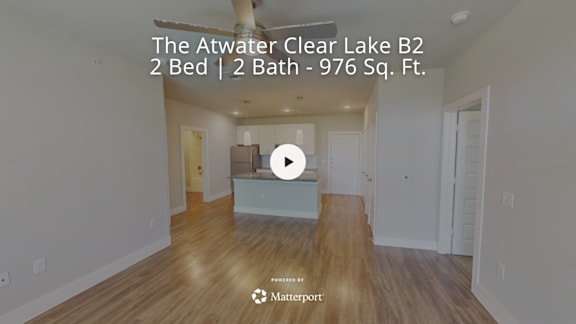 A video thumbnail for a 2 bedroom, 2 bathroom property at 976 square feet.