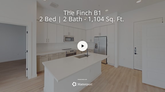 A kitchen with a video player overlay.