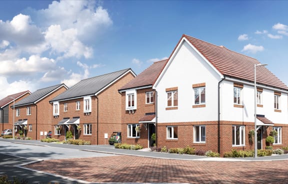 a row of brick and white houses on a street