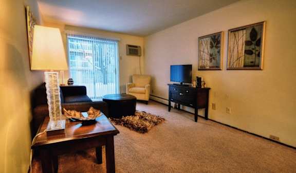 a living room with a couch and a table