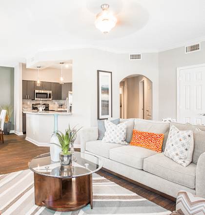 a living room with a couch and a table