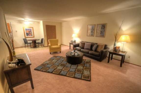 a living room with a couch and a table