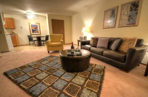 a living room with a couch and a table