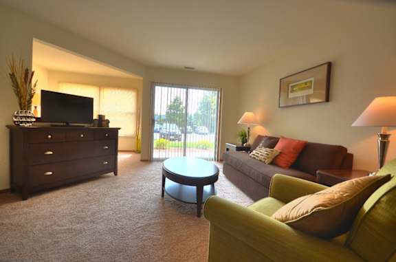 a living room with a couch and a table