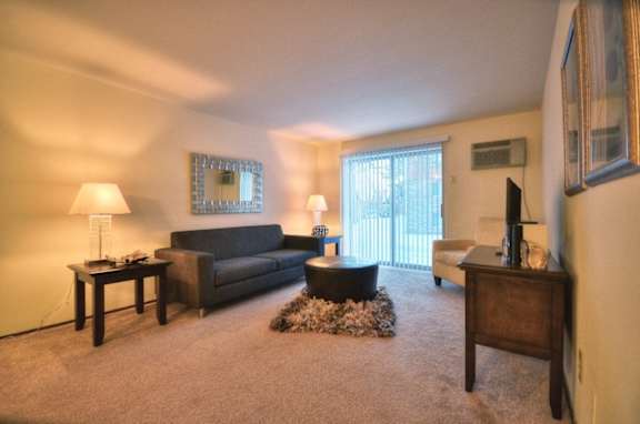 a living room with a couch and a table