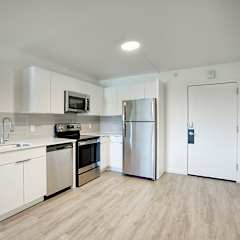 kitchen area in a one bedroom apartment at Presidio Palms Apartments, Arizona