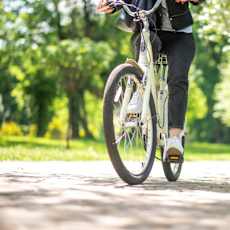 A person riding a bicycle at Spring Woods Apartments, Oregon